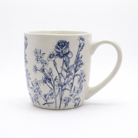 Cuire Floral Blue & White Ceramic Coffee Mug | Mug for Him & Her | Perfect for Gifting | 580ml (Set of 1)
