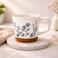 Cuire Floral Embossed Black & White Ceramic Coffee Mug with Brown Base | Mug for Him & Her | Perfect for Gifting | 450ml (Set of 1)
