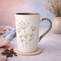 Cuire Beige Coloured Floral Embossed Ceramic Coffee Mug | Mug for Him & Her | Perfect for Gifting | 320ml (Set of 1)