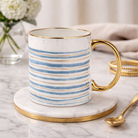 Cuire Azure Gold Waves Ceramic Coffee Mug 340ml | Blue Watercolor Design with Gold Handle & Rim | Stain Resistant, Thermal Resistant | Strong & Durable Tea & Coffee Cup (Blue with Golden Stripes)