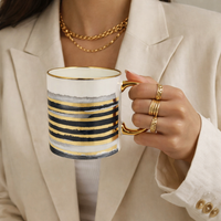Cuire Azure Gold Waves Ceramic Coffee Mug 340ml | Blue Watercolor Design with Gold Handle & Rim | Stain Resistant, Thermal Resistant | Strong & Durable Tea & Coffee Cup (Black with Golden Stripes)